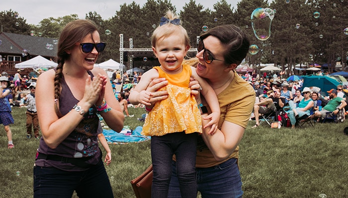 Family enjoying Blue Ox Music Festival