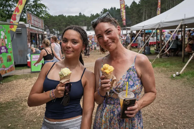 two women with ice cream cones