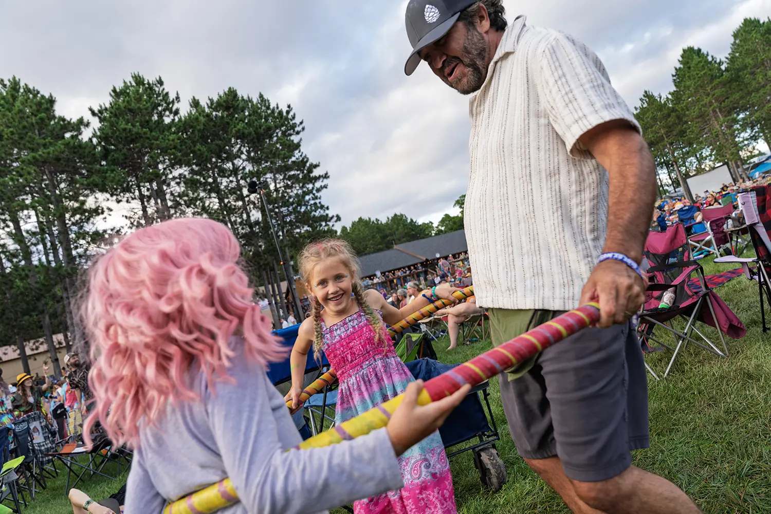 2 children and adult man dancing at blue ox music fest