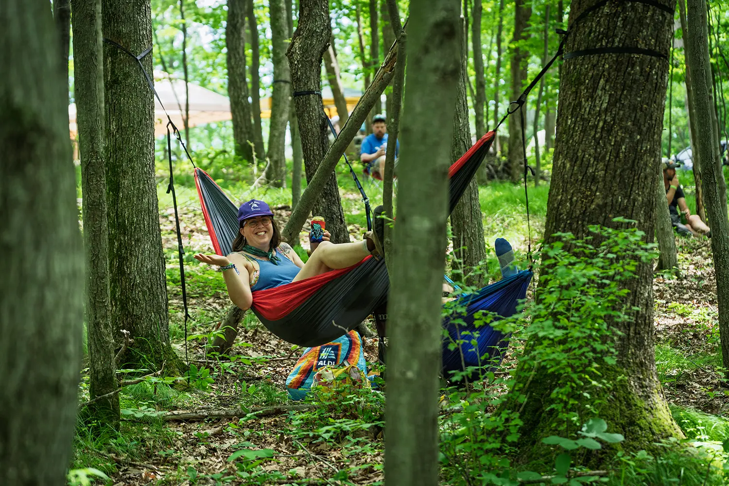 adult in hammock smiling